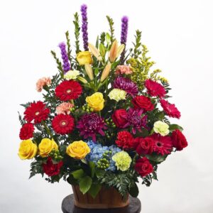 Tall arrangement in wicker